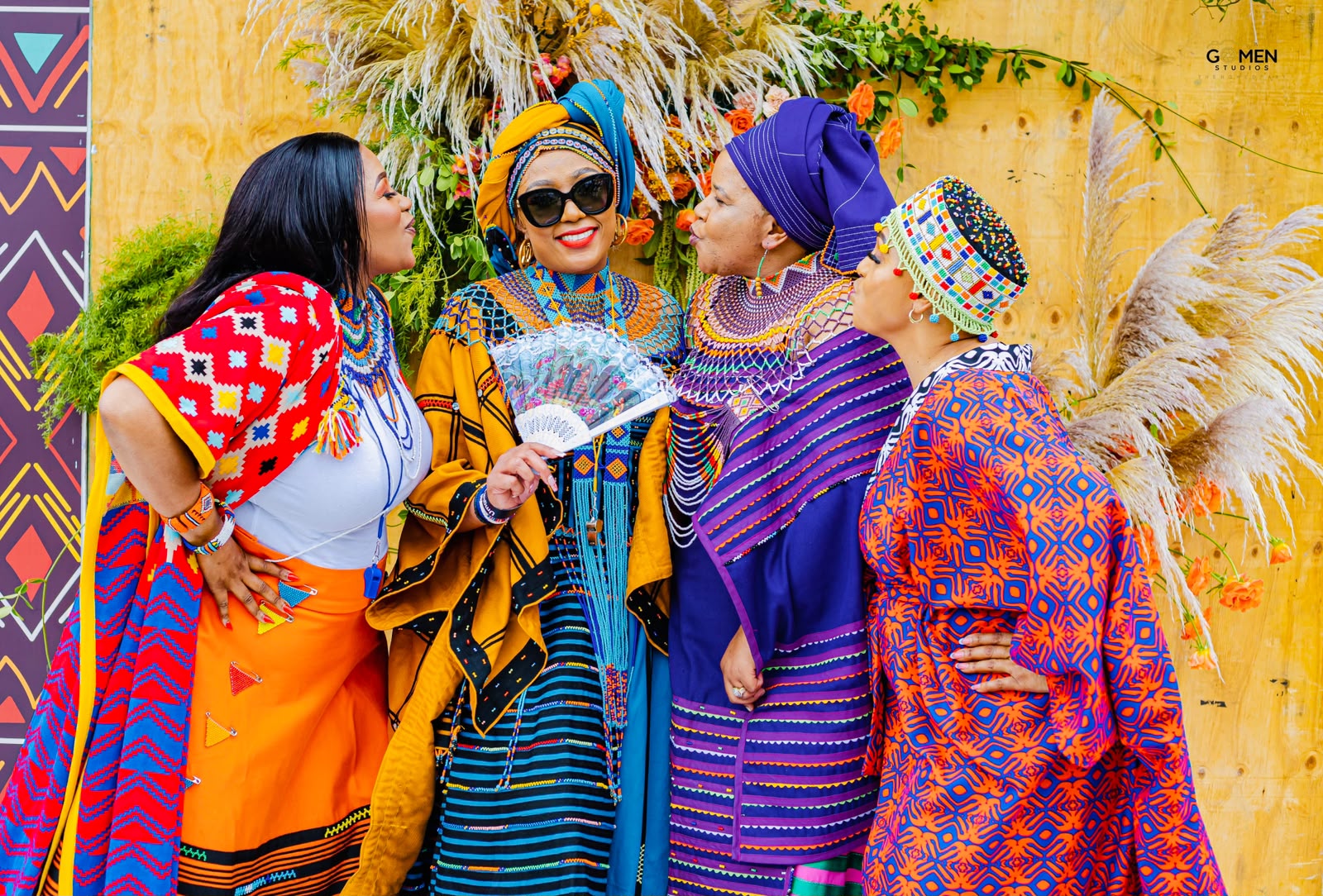 Buli with friends in vibrant traditional attire